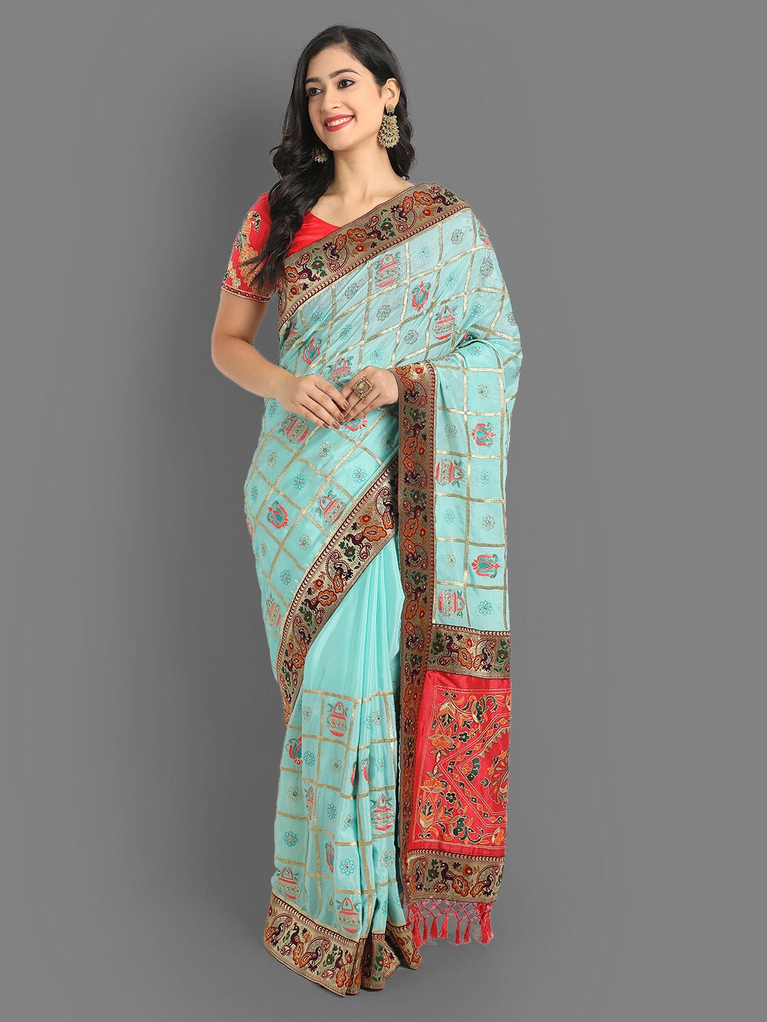 

Ekta Textiles Ethnic Motifs Zari Silk Blend Patola Saree, Turquoise blue