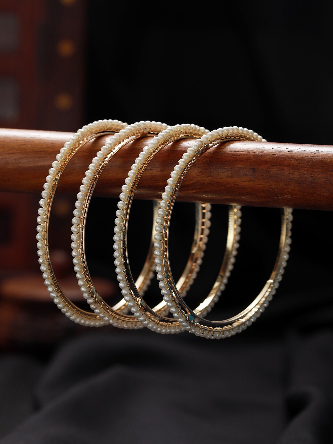 

Jazz and Sizzle Set Of 4 Gold-Plated Peal Beaded Bangles