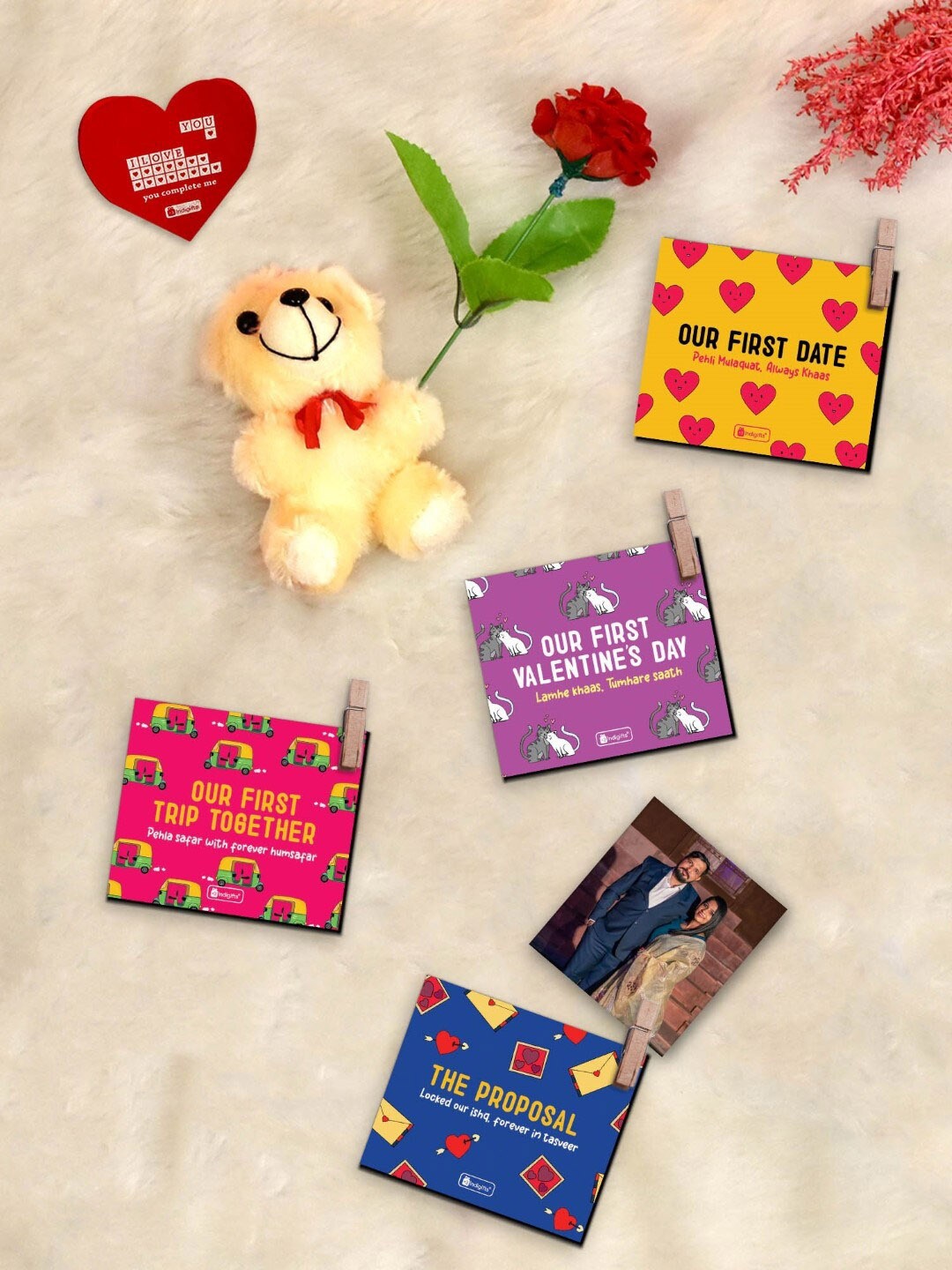 

Indigifts Valentine Day Love Gifts Box 7 Pcs Photo Clip & Rose with Greeting Card & Teddy, Red