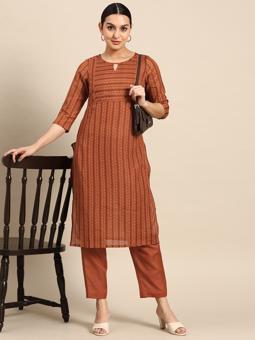 

Anouk Women Striped Kurta with Trousers, Rust
