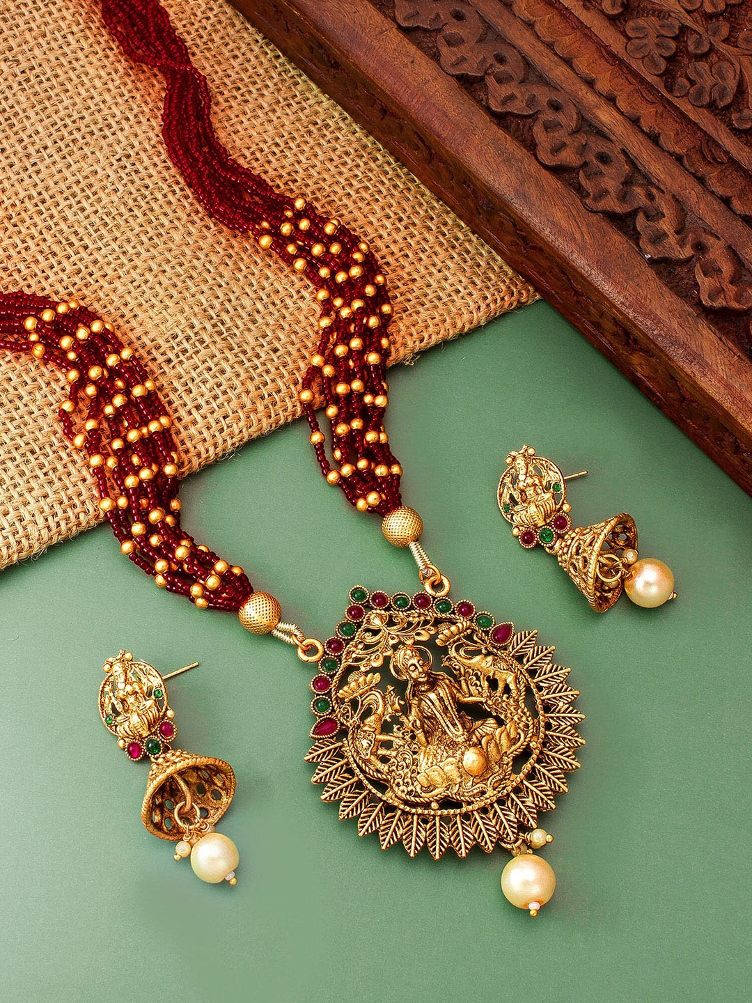 

aadita Gold-Plated Stone Studded Temple Jewellery Set