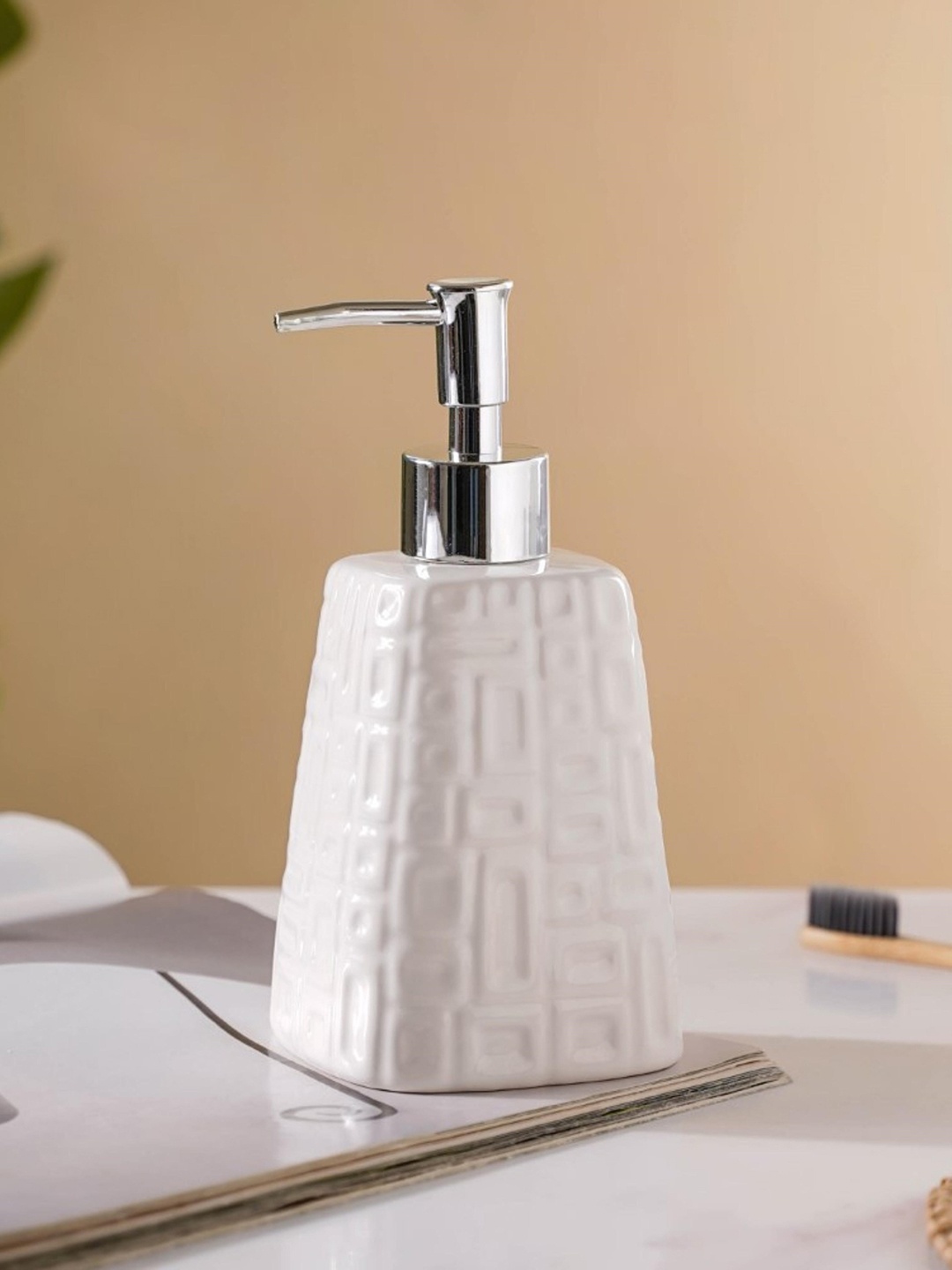 

Nestasia White Textured Rust Poof Pyramid Ceramic Soap Dispenser
