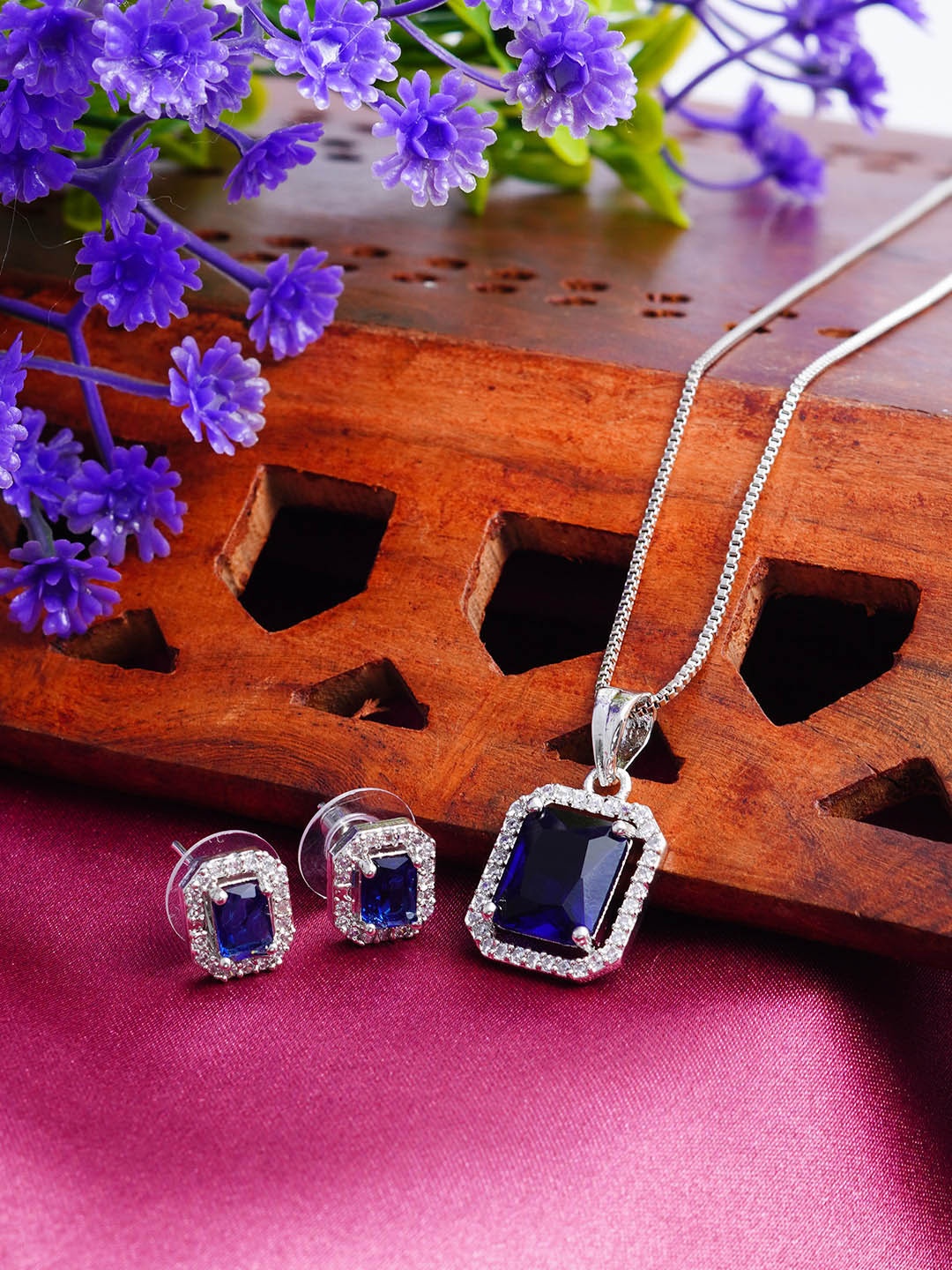 

Urmika Artificial Stones Studded Pendant With Earrings, Blue