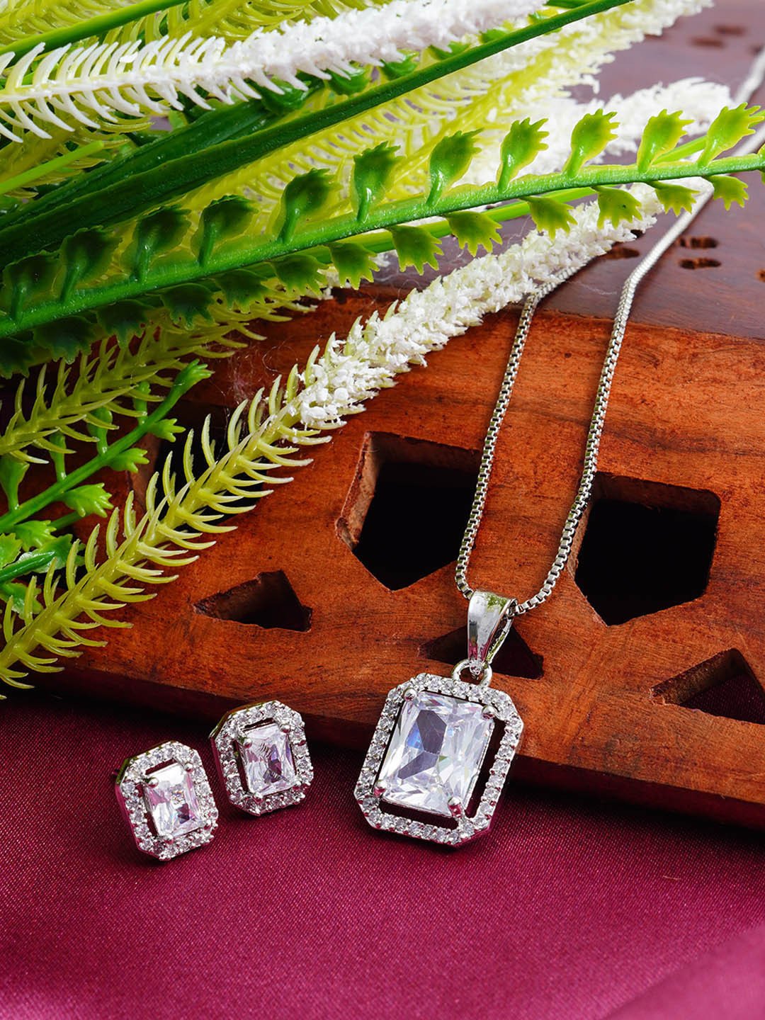 

Urmika Artificial Stones Studded Pendant With Earrings, White