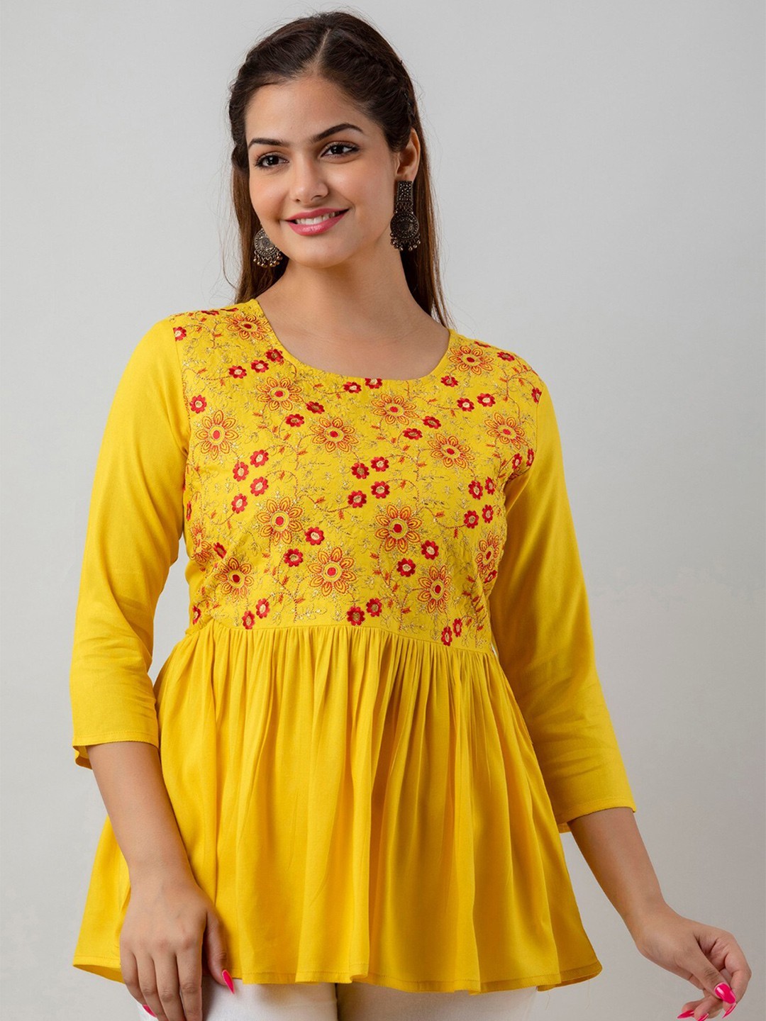 

Women Touch Floral Embroidered Empire Top, Yellow