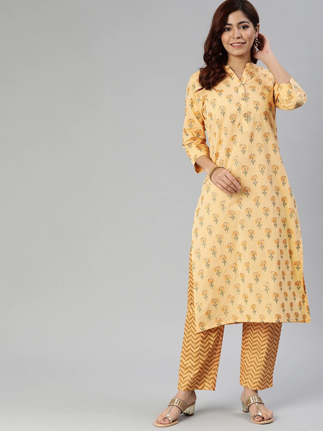 

Divena Women Floral Printed Sequinned Pure Cotton Kurta with Trousers, Yellow
