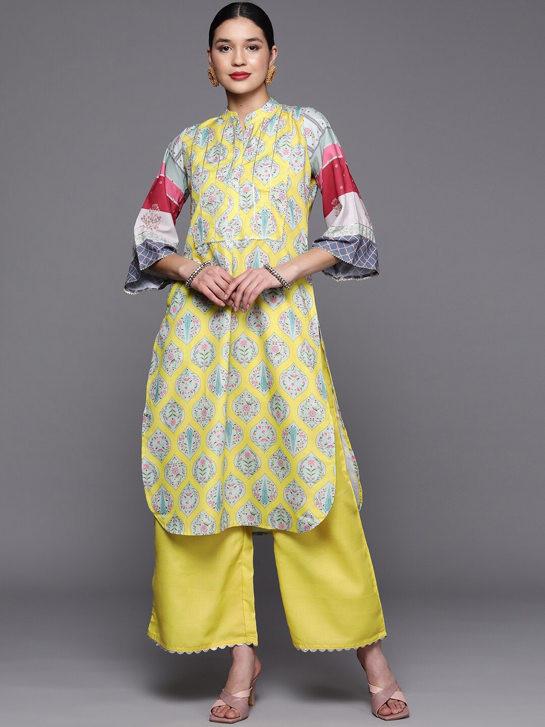 

Ahalyaa Women Ethnic Motifs Printed Gotta Patti Kurta with Palazzos, Yellow