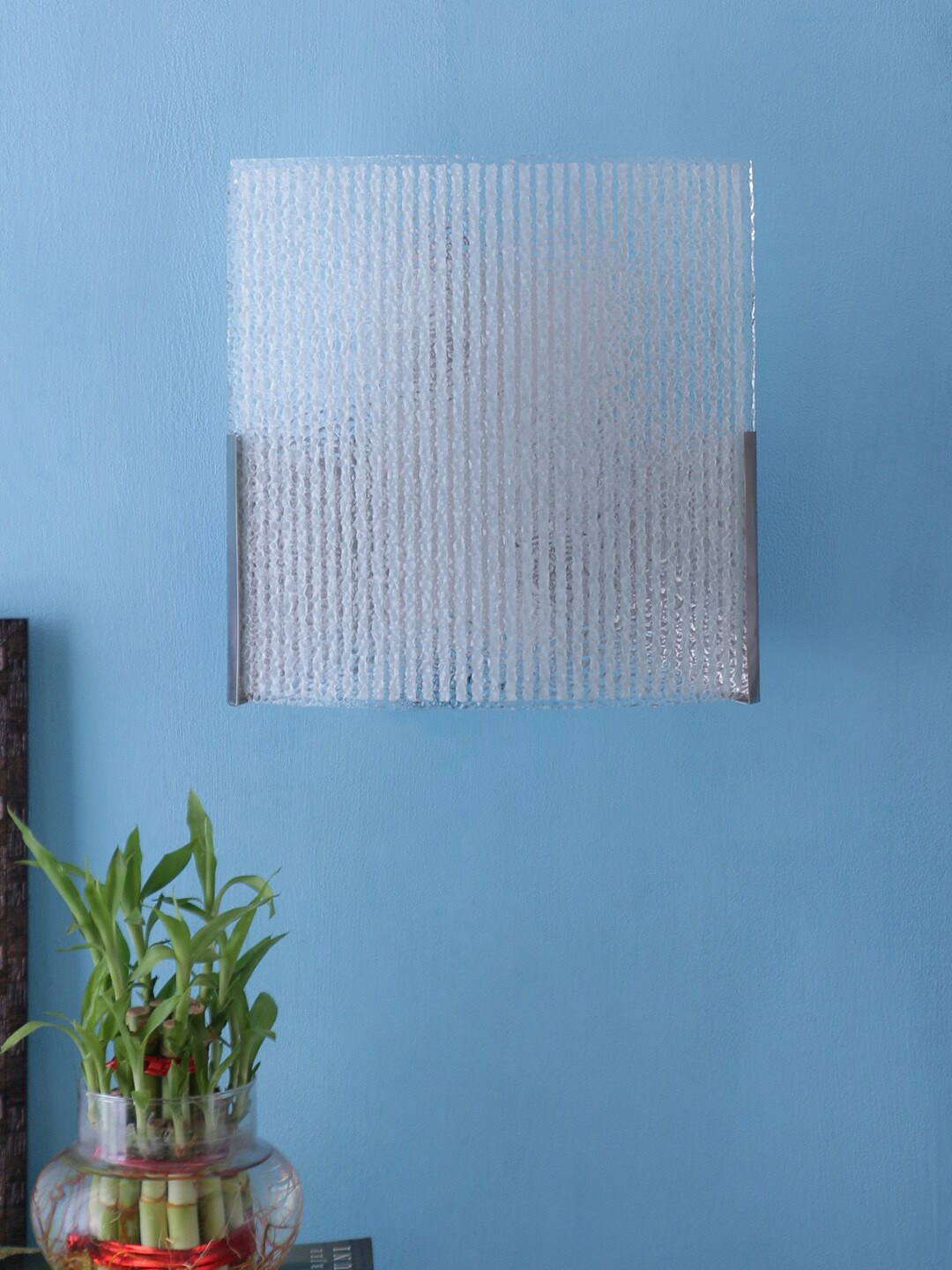 

Devansh White Textured Dual Glass Wall Mounted Lamp
