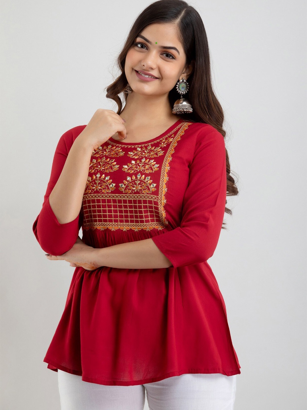 

Women Touch Embroidered Round Neck Peplum Top, Maroon