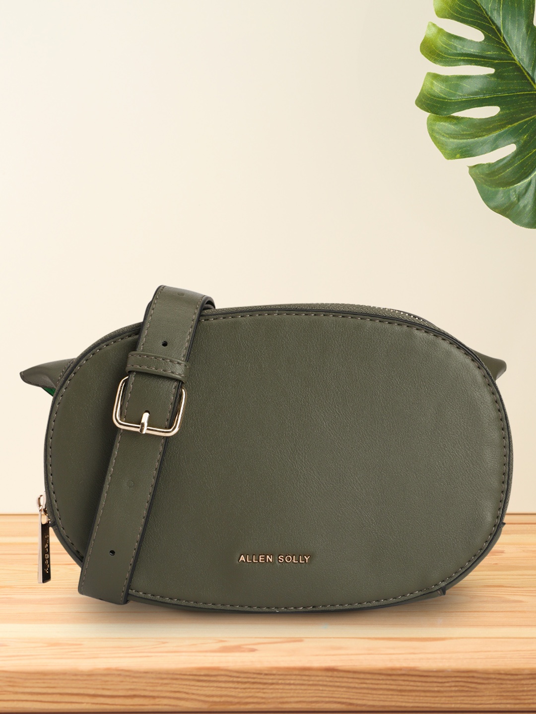 

Allen Solly Solid PU Half Moon Sling Bag With Adjustable Sling Strap, Olive