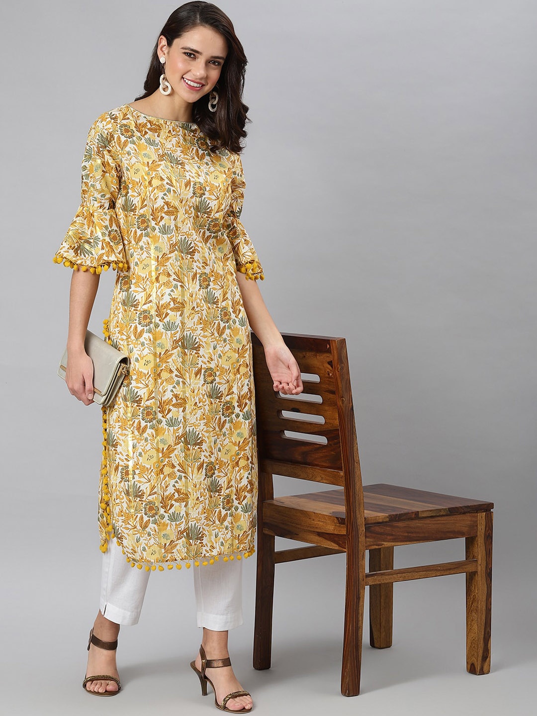 

Khushal K Women Cotton Ethnic Motifs Printed Flared Sleeves Kurta, Yellow