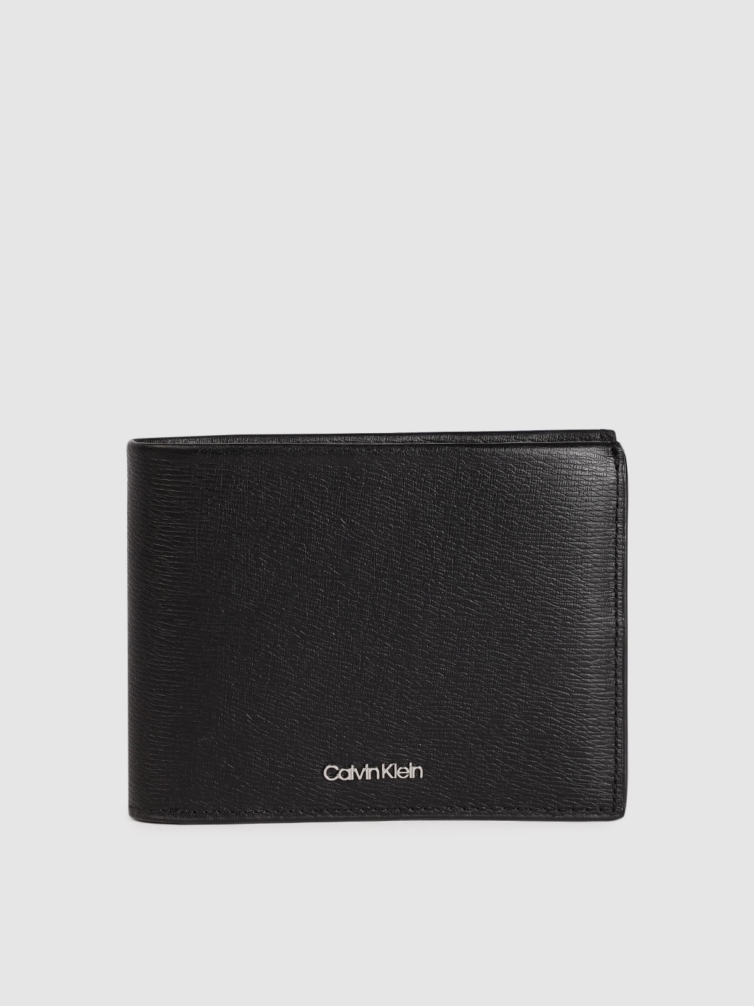 

Calvin Klein Men Animal Textured Leather Two Fold Wallet With RFID, Black