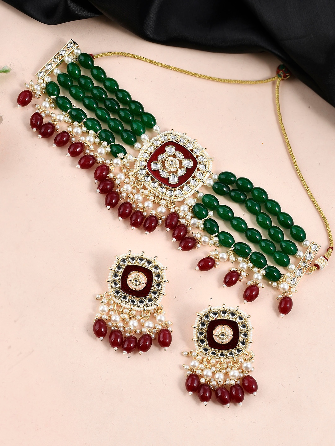 

Shoshaa Gold-Plated Kundan Studded Beaded Brass Jewellery Set, Green