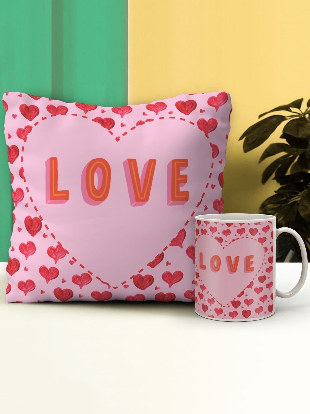 

Indigifts Pink & Red Printed Pre-Filled Cushions With Ceramic Mug