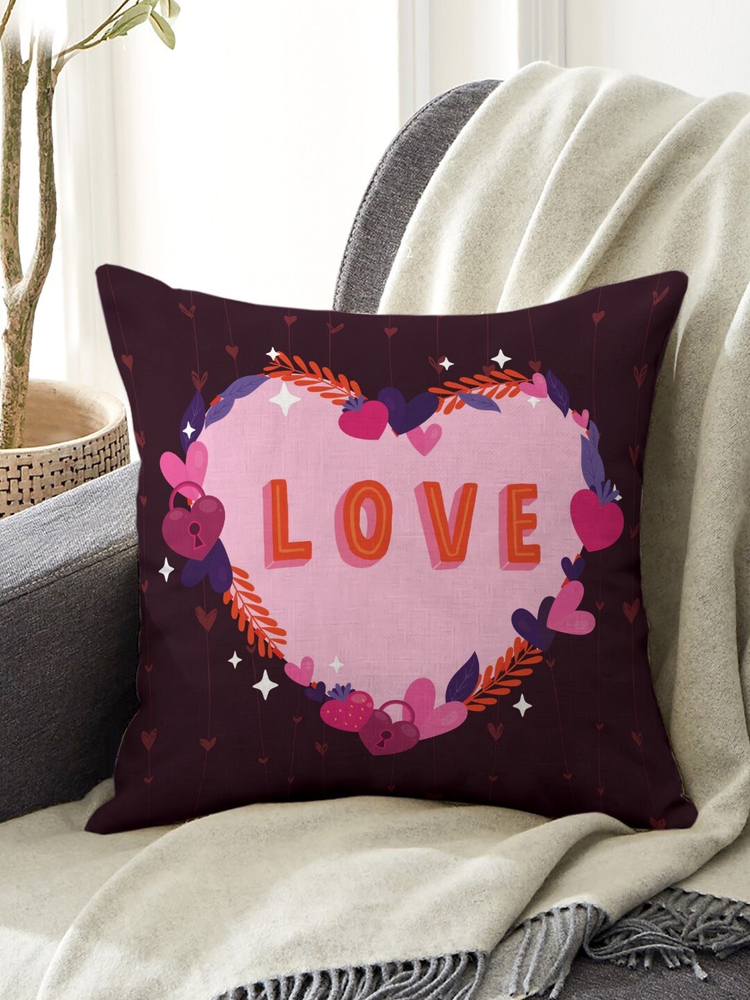 

Indigifts Purple & Pink Printed Pre-Filled Cushions