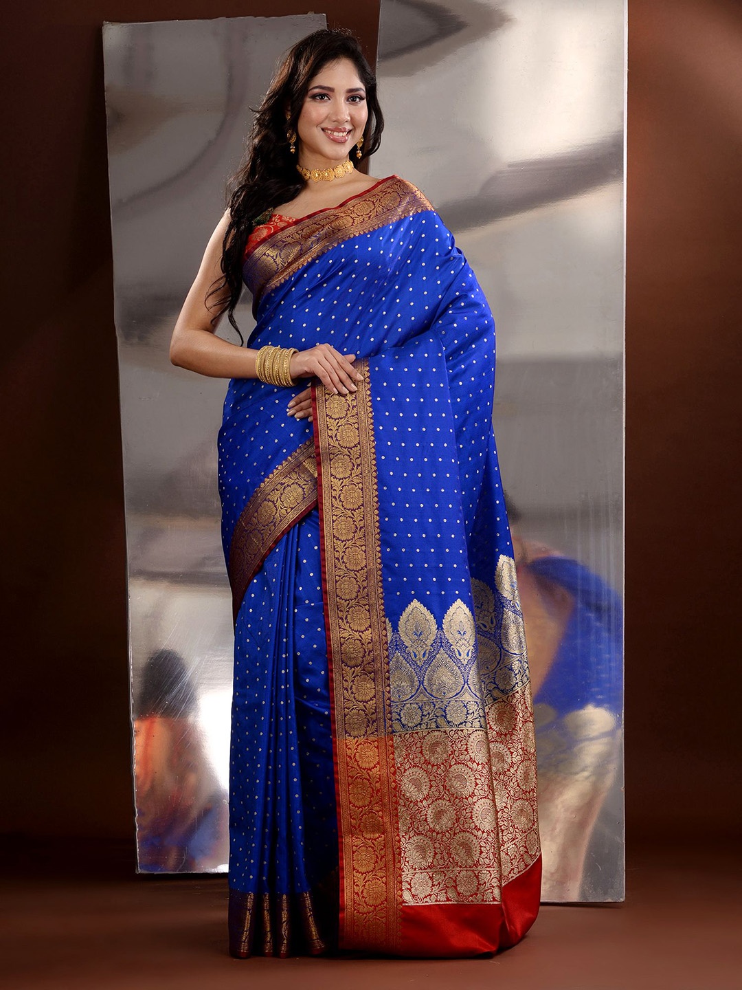 

Charukriti Woven Design Ethnic Motifs Zari Saree, Blue