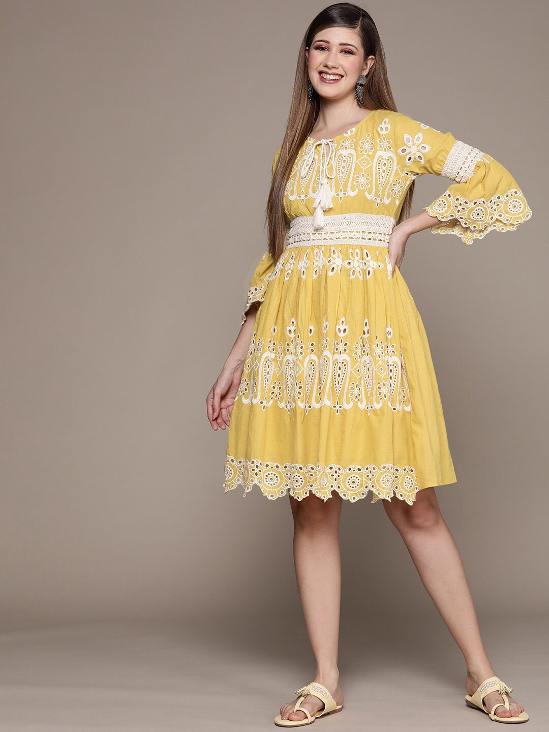 

Ishin Mustard Schiffli Embroidered Tie-Up Neck Cotton Dress
