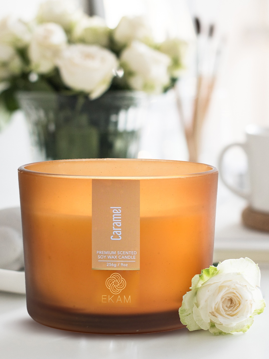 

Ekam Orange Colored & Cream Colored Caramel 3 Wick Scented Candle
