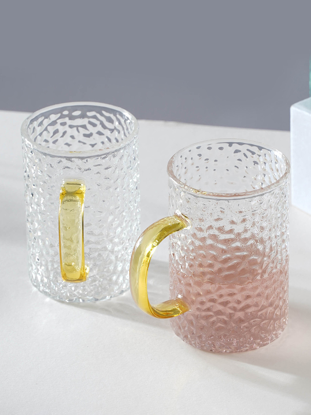 

Nestasia Transparent & Yellow 2 Pcs Textured Glass Glossy Mugs 300 ml Each