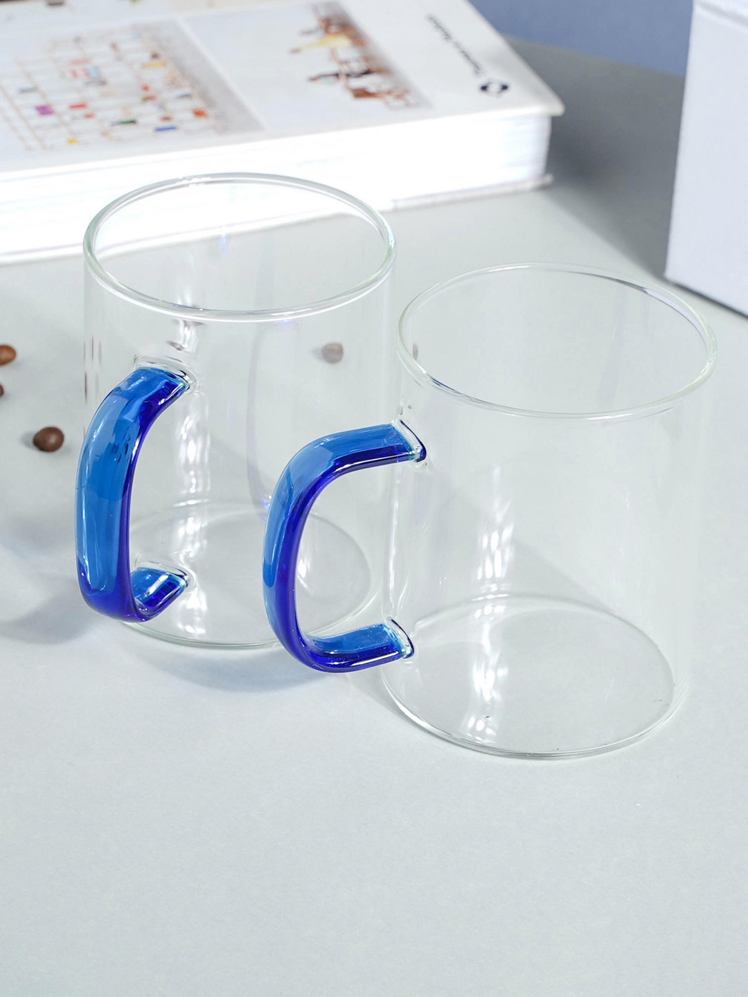 

Nestasia Transparent & Blue 2 Pcs Solid Glass Mugs 400 ml Each