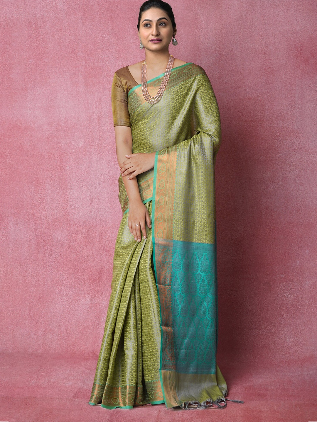 

Unnati Silks Woven Design Zari Silk Blend Banarasi Saree, Green