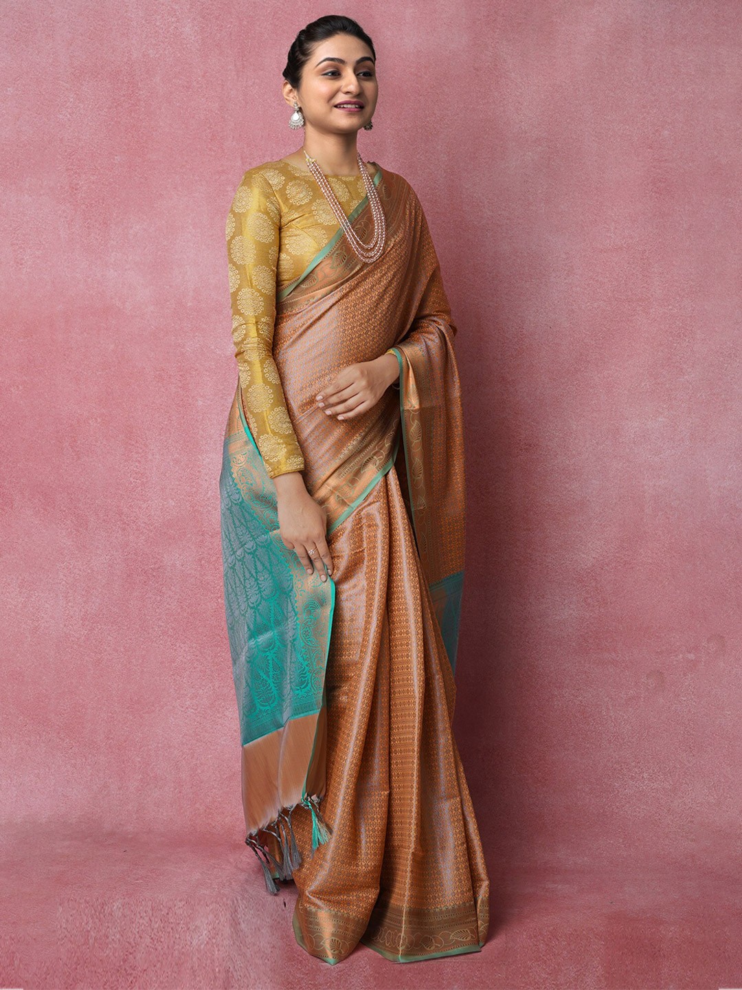 

Unnati Silks Woven Design Zari Silk Blend Banarasi Saree, Orange