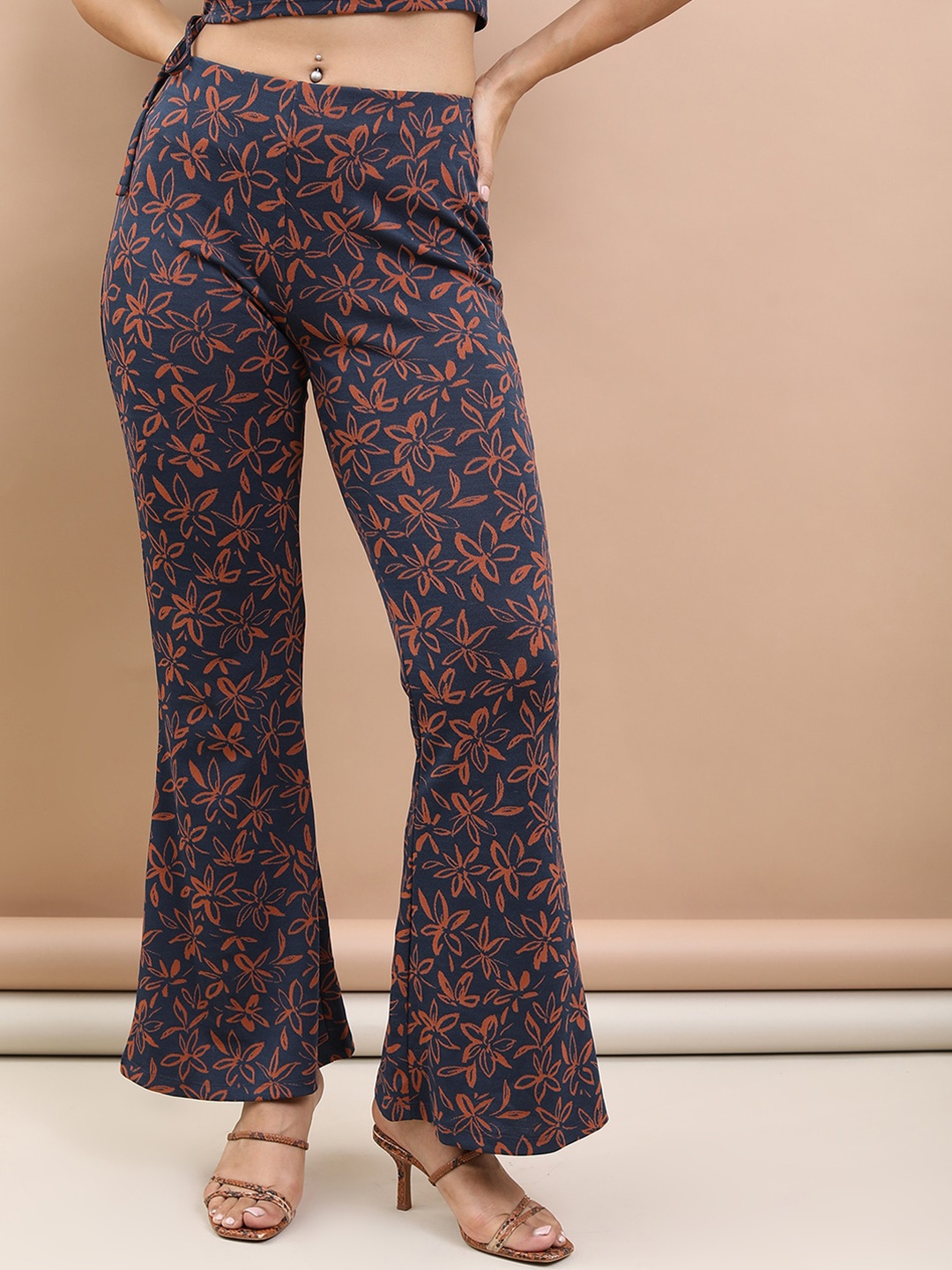 

Tokyo Talkies Women Floral Printed Flared Trousers, Navy blue