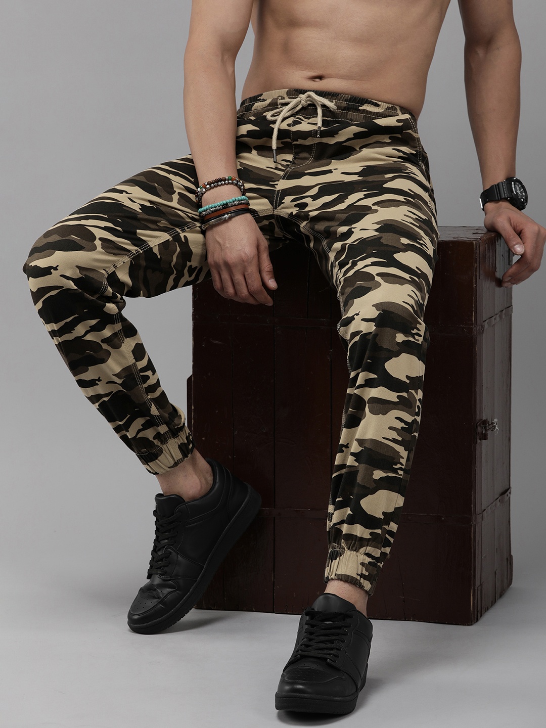 

The Roadster Lifestyle Co. Men Camouflage Printed Pleated Joggers, Olive