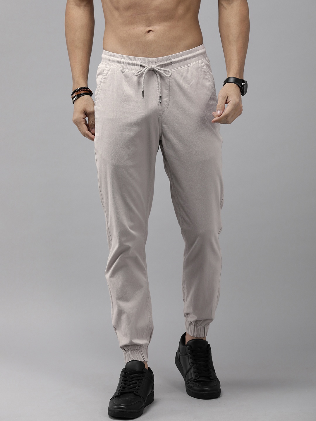

The Roadster Life Co. Men Solid Mid-Rise Joggers Trousers, Off white