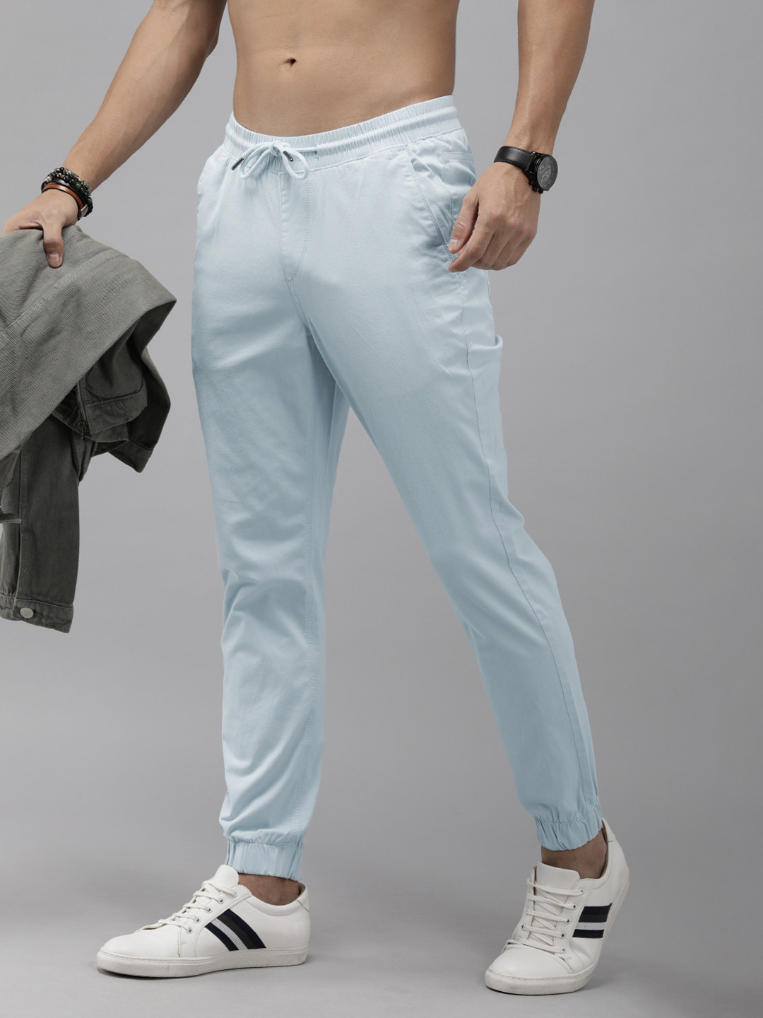 

The Roadster Lifestyle Co. Men Solid Mid Rise Flat Front Joggers, Blue