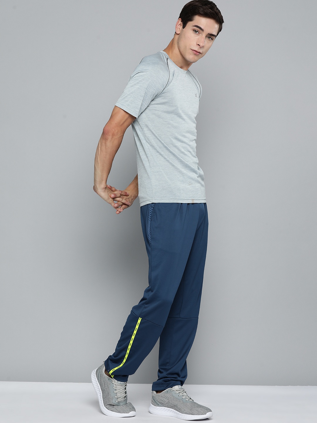 

HRX by Hrithik Roshan Men Solid Training Track Pants, Blue