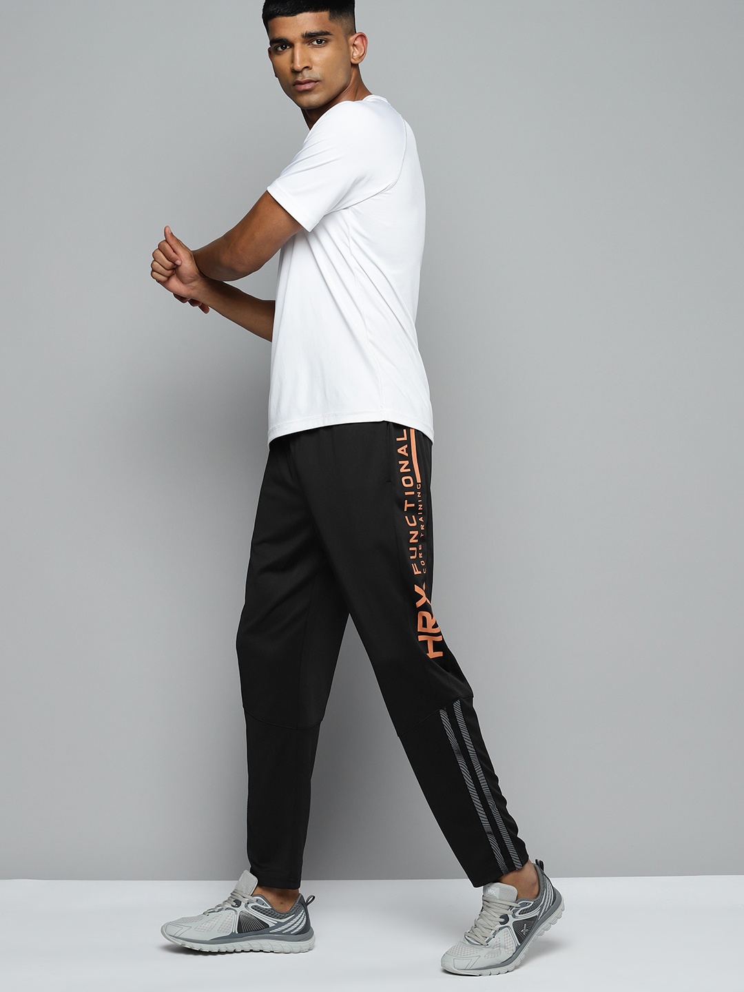 

HRX by Hrithik Roshan Men Typographic Detail Rapid-Dry Training Track Pants, Black