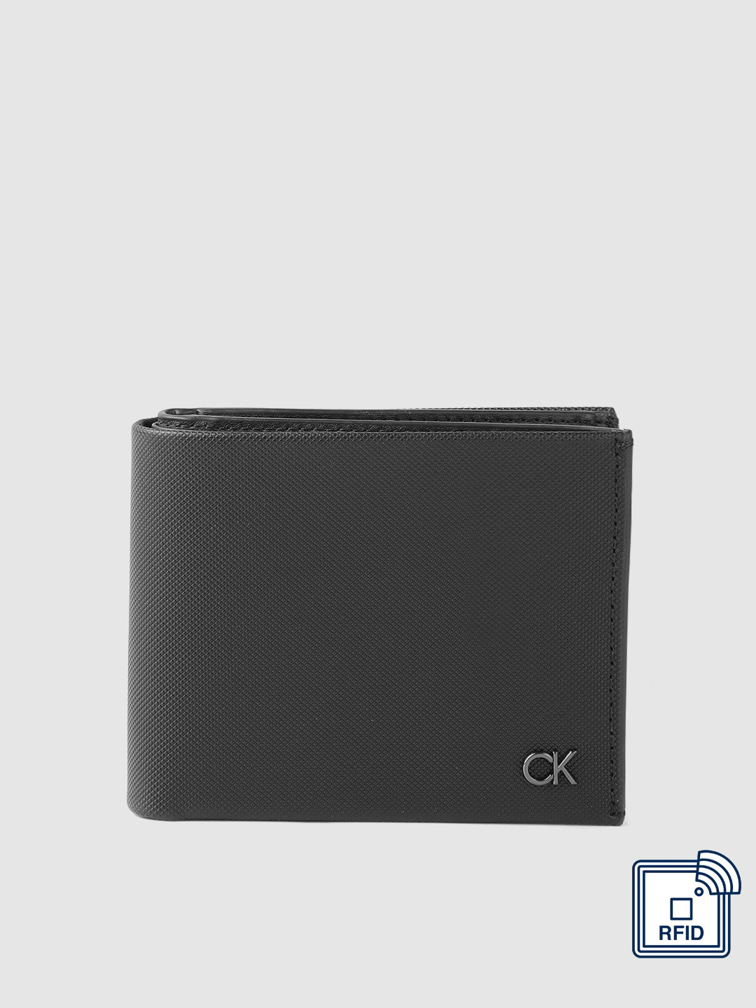 

Calvin Klein Men Textured Leather Two Fold Wallet, Black