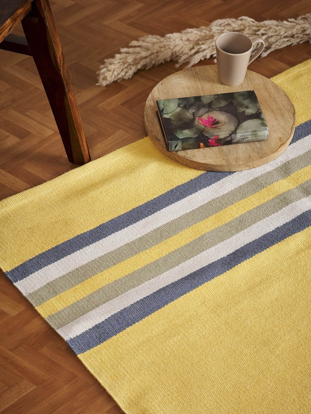 

Fabindia Ihania Yellow Striped Woven Dhurrie