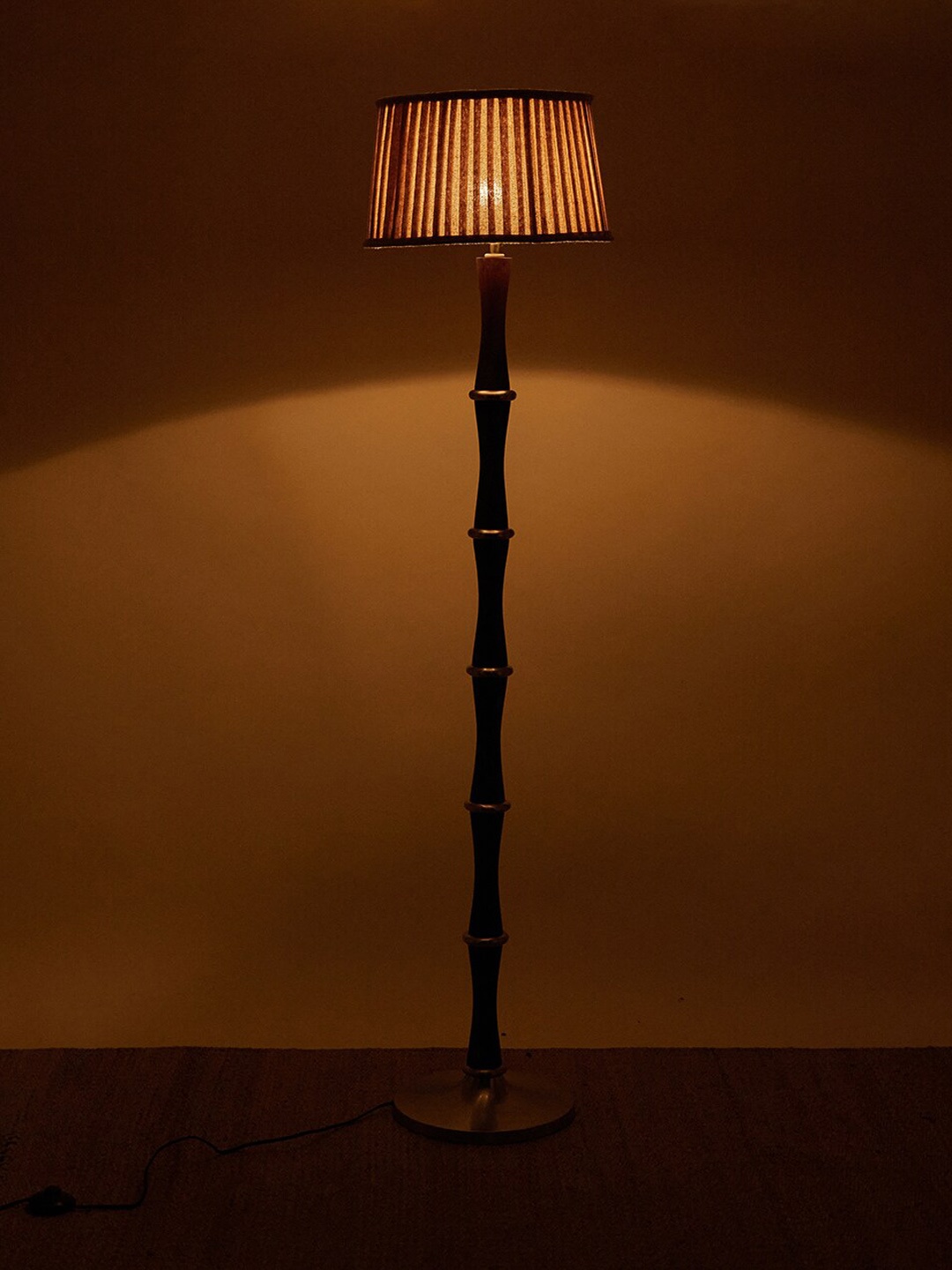 

Fabindia Ash Bamboo Brown Textured Wooden Floor Lamp With Shade
