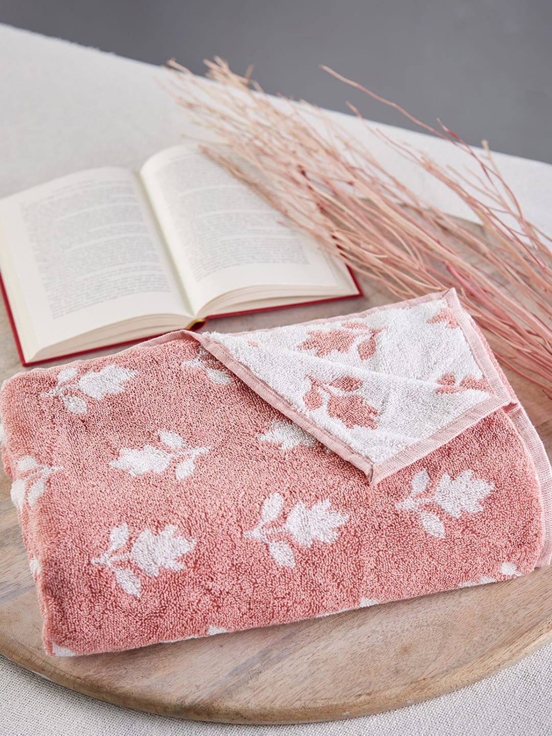 

Fabindia Smriti Pink & White Floral Printed 570 GSM Cotton Woven Towel