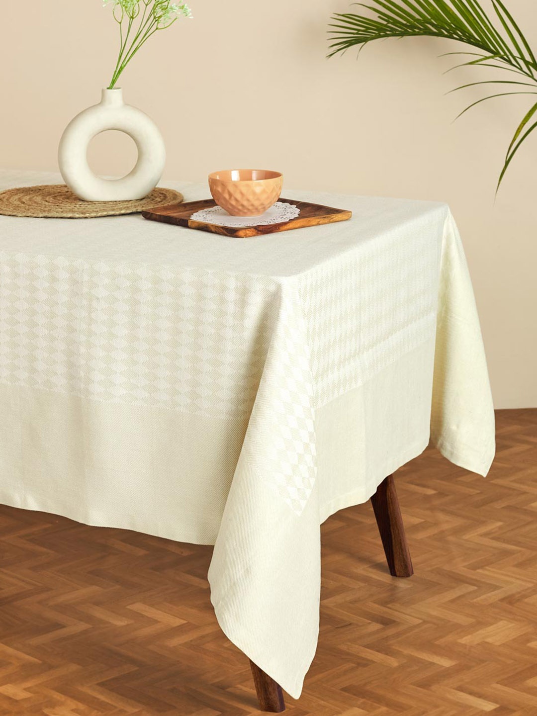 

Fabindia Natural Dhaani Cream and White Geometric Woven Design 6-Seater Table Cover