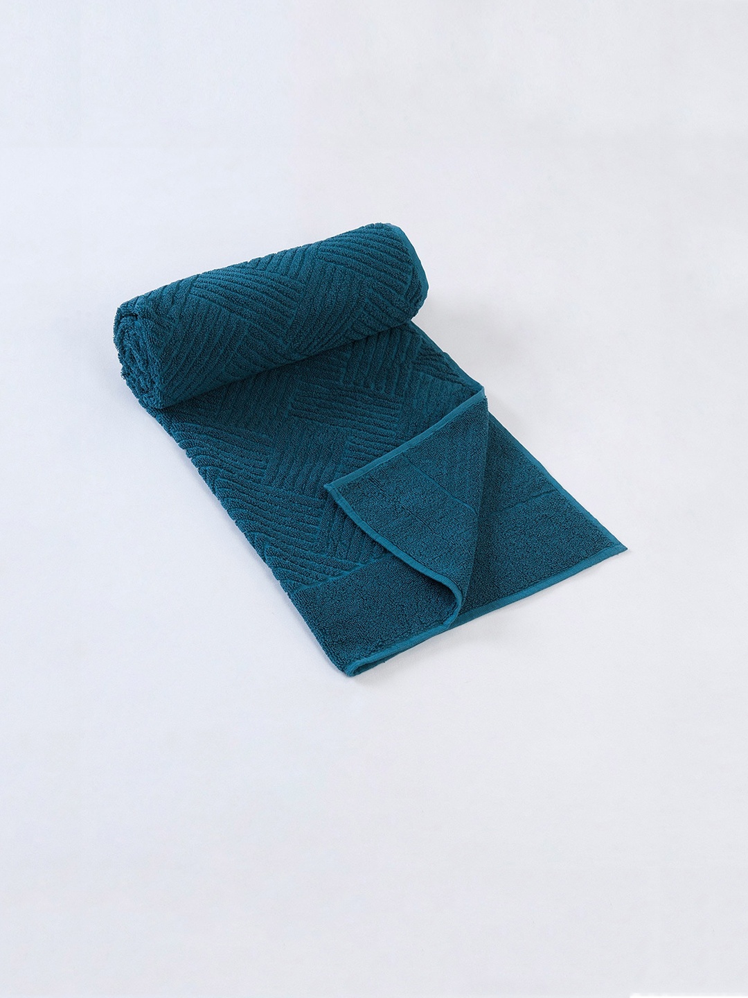 

Fabindia Teal Green Self-Design 500 GSM Cotton Pile Towel