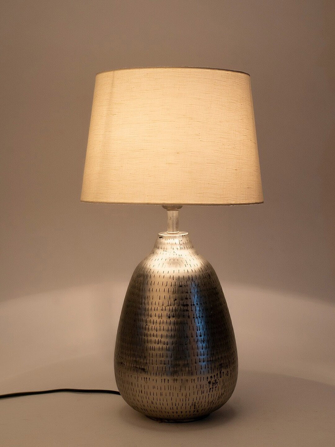 

Fabindia Dev Grey & White Textured Metal Table Lamp