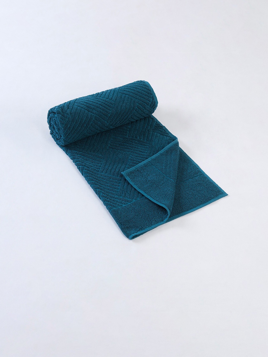 

Fabindia Teal Green Printed 500 GSM Cotton Pile Bath Towel