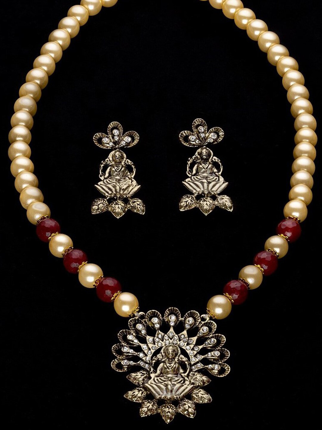 

Estele Gold Plated Antique Laxmi Devi Designer Necklace Set with Pearls, Red