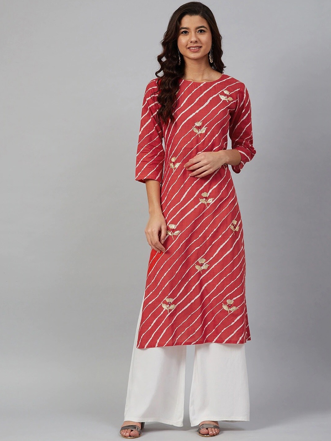 

Meeranshi Women Leheriya Striped Gotta Patti Round Neck Kurta with Palazzos, Orange