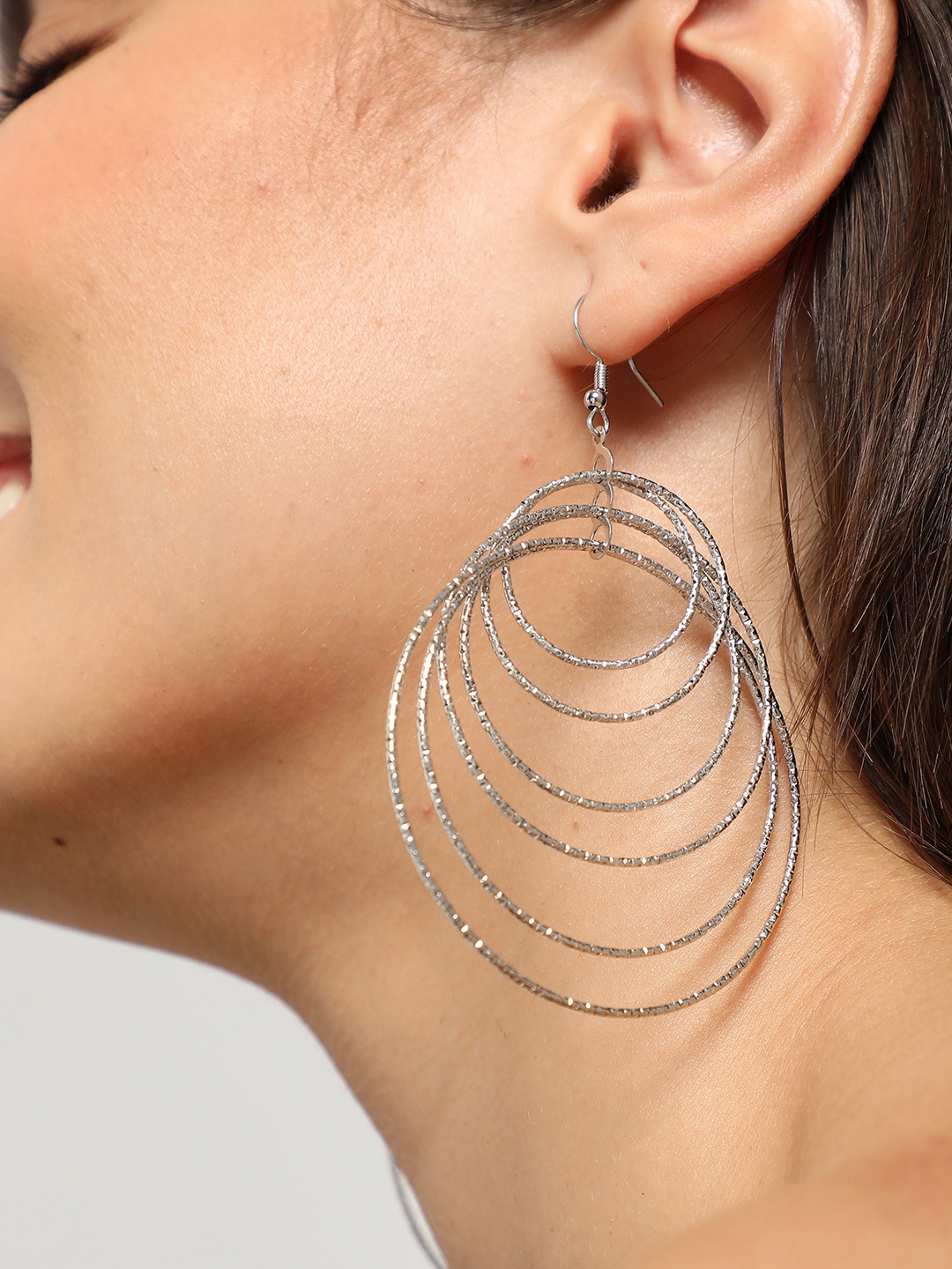 

SOHI Silver-Plated Contemporary Drop Earrings