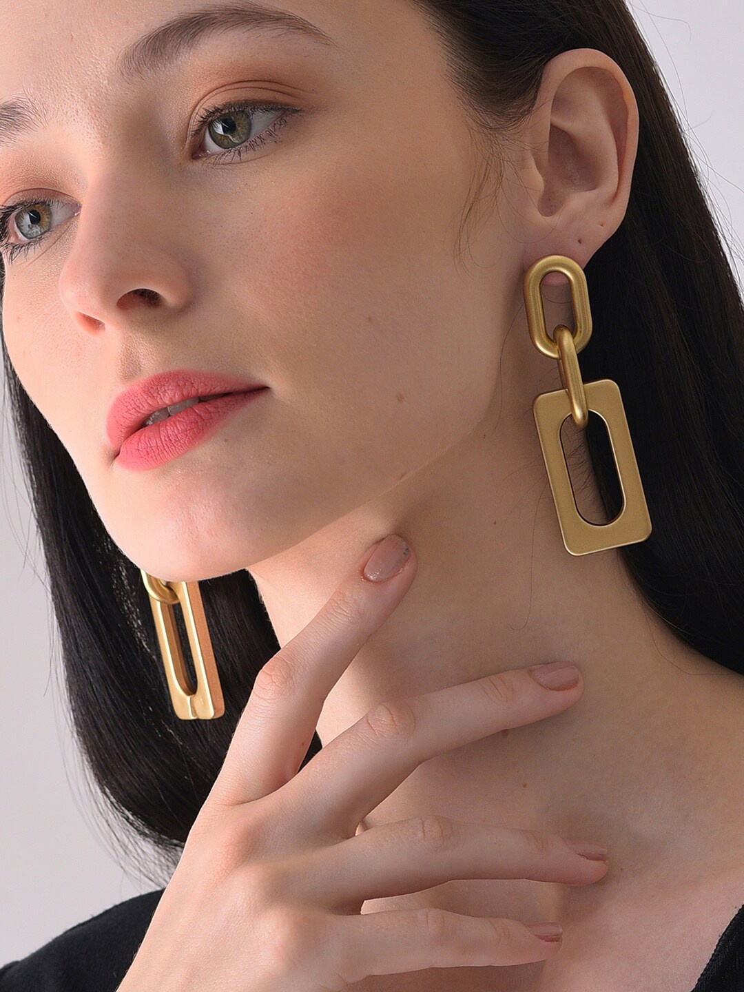 

SOHI Gold-Plated Contemporary Drop Earrings