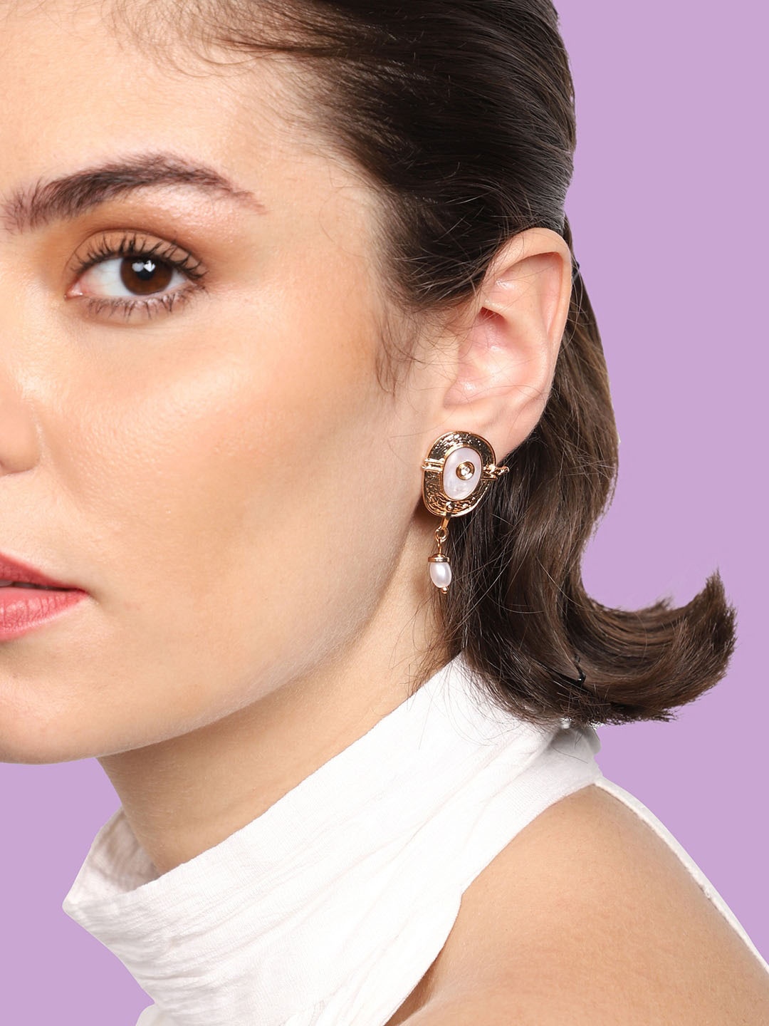 

SOHI Gold-Plated Contemporary Drop Earrings
