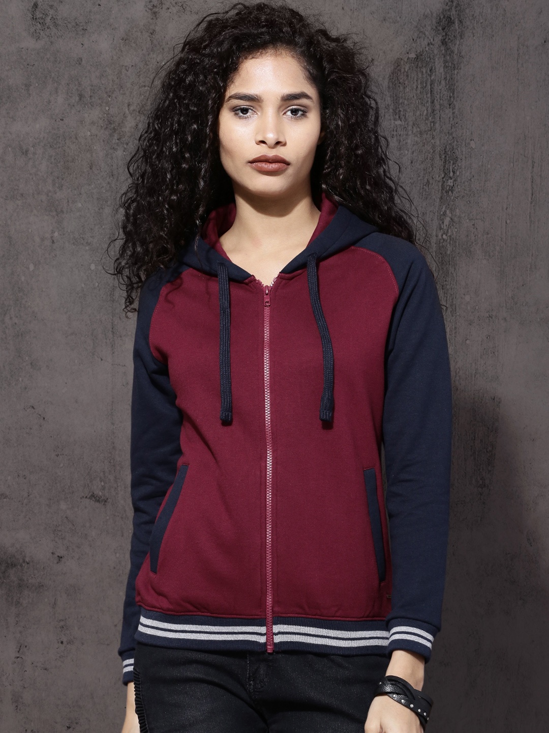 

Roadster Women Maroon Solid Hooded Sweatshirt