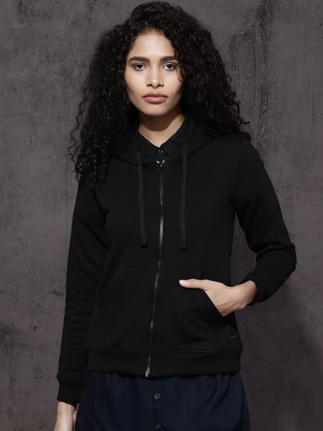 

Roadster Women Black Solid Hooded Sweatshirt