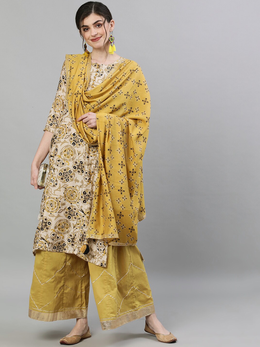 

Ishin Women Ethnic Motifs Printed Pure Silk Kurta with Sharara & Dupatta, Beige