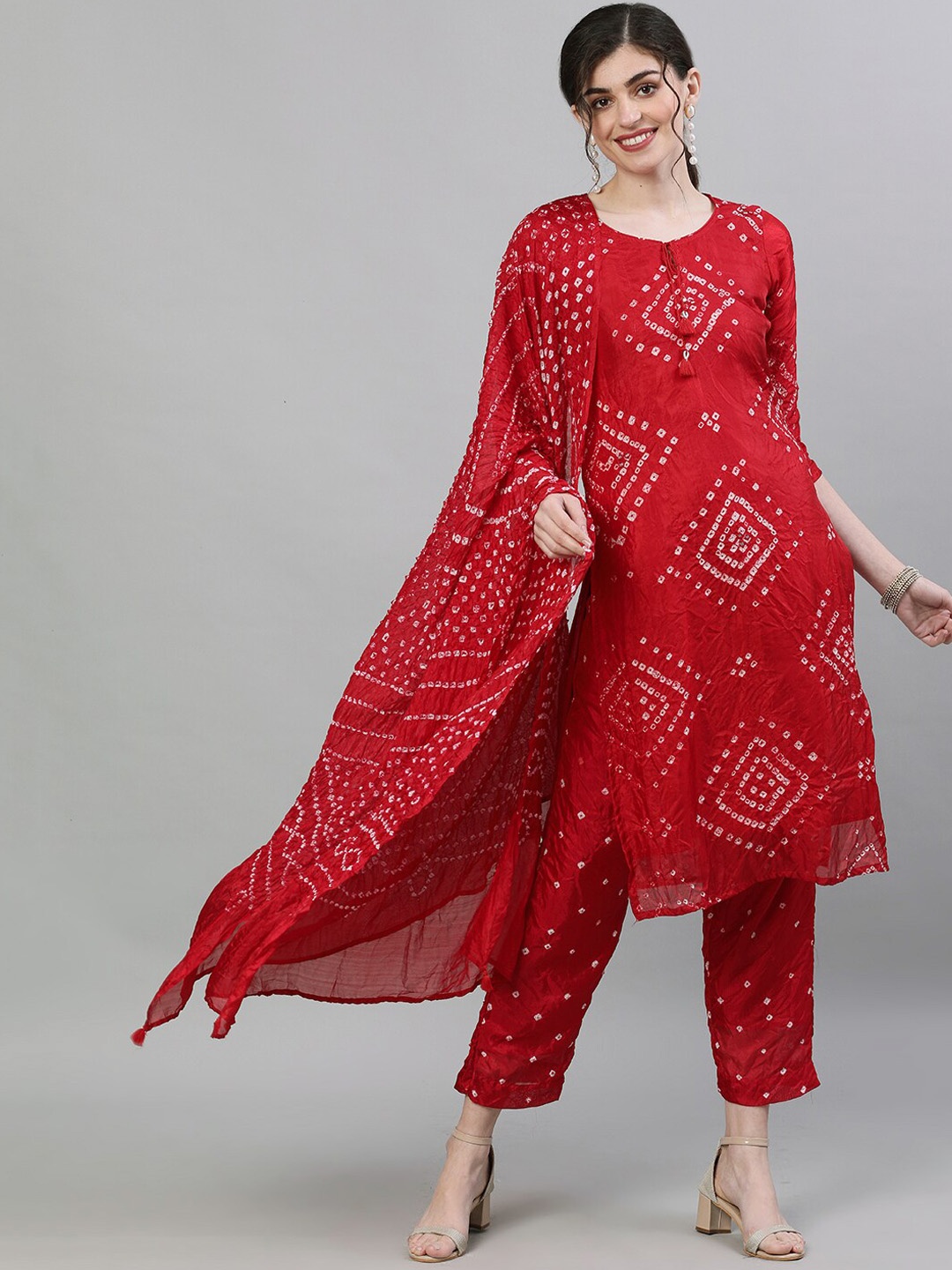 

Ishin Women Bandhani Dyed Mirror Work Kurta with Trousers & With Dupatta, Red