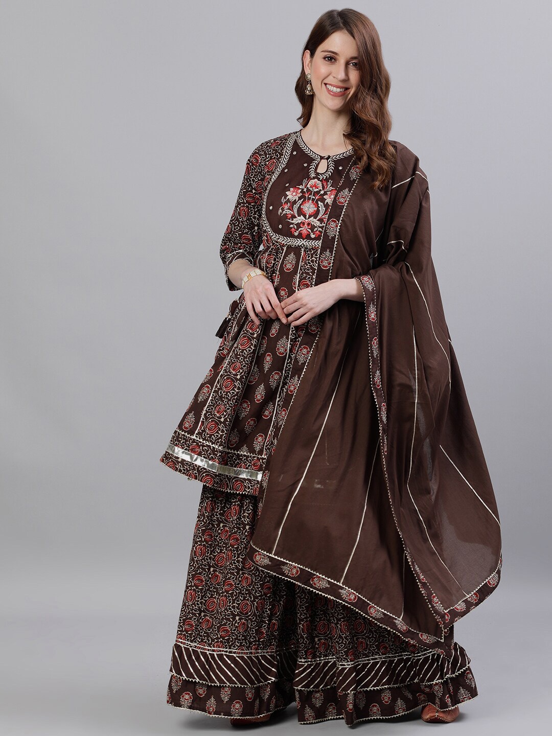 

Ishin Floral Printed Empire Gotta Patti Pure Cotton Kurta with Sharara & With Dupatta, Brown